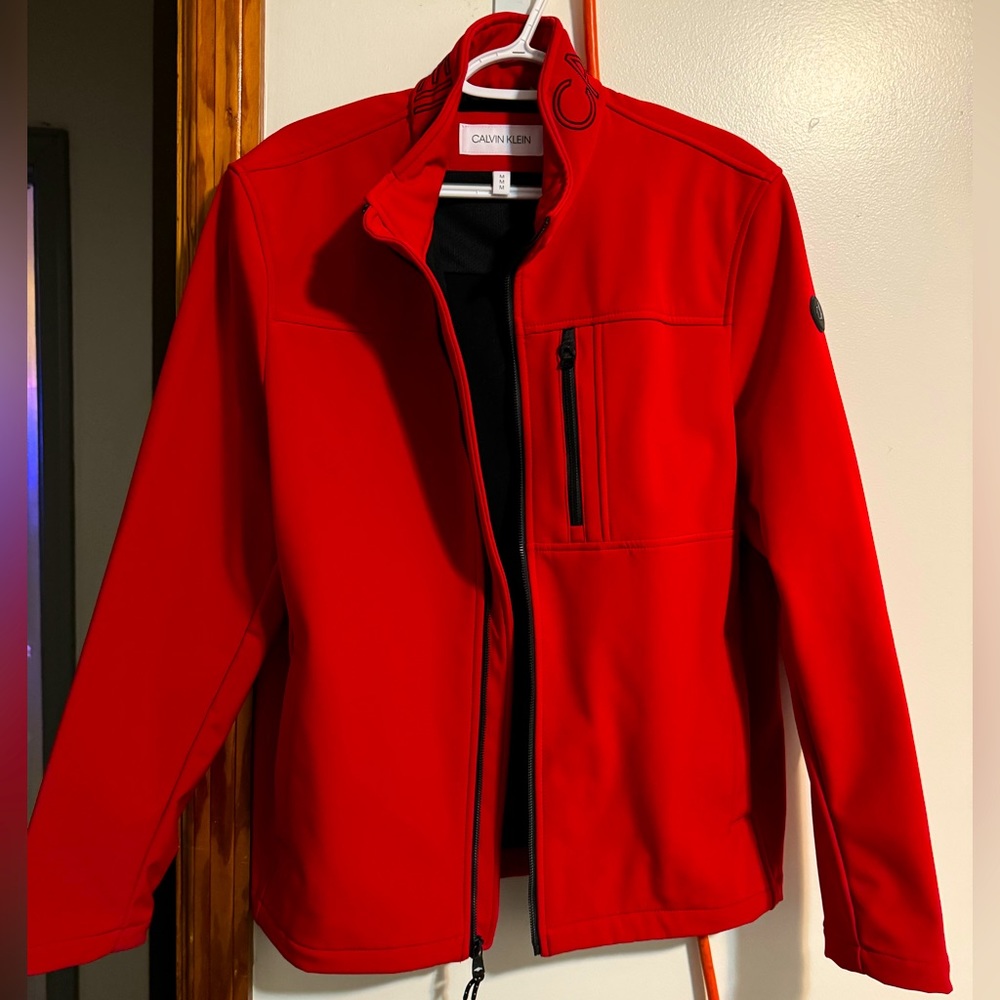 Calvin Klein. Mens size medium. Red coat